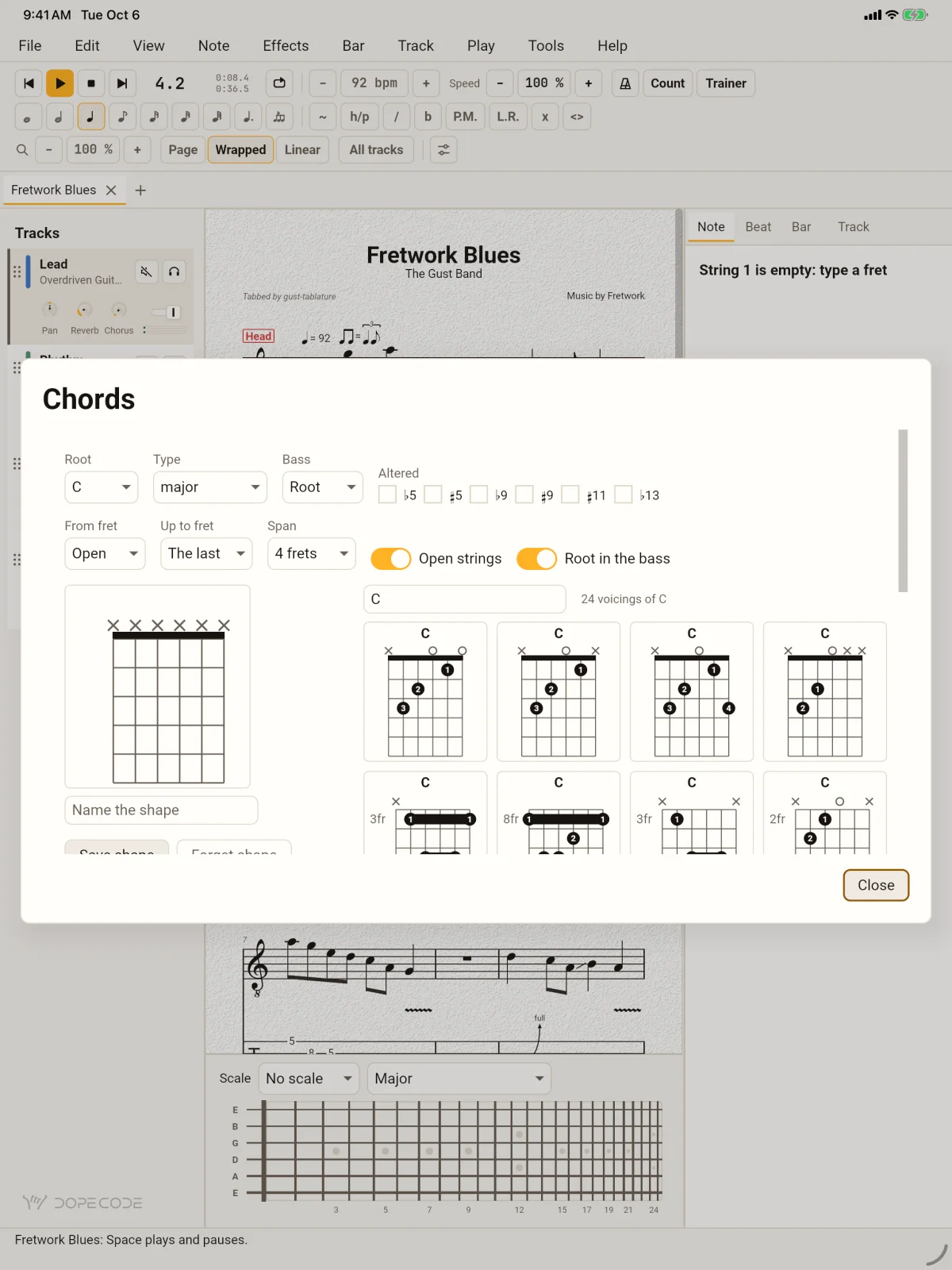 GuitarLab on an iPad with the Chords sheet open over the blues: root C, type major, open strings and root in the bass switched on, and eight of the twenty-four voicings of C as diagrams.